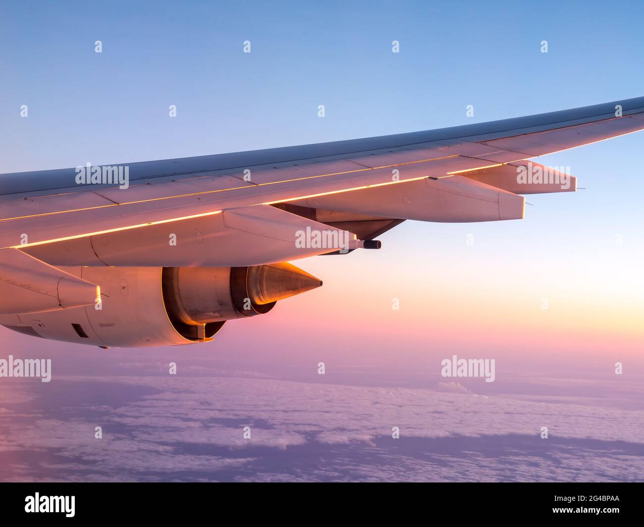 Jet engine of aircraft with outside morning warm sunlight Stock Photo