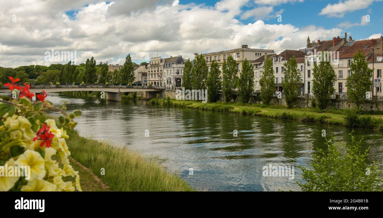 view of the banks of the Seine in the city of Melun in June Stock Photo