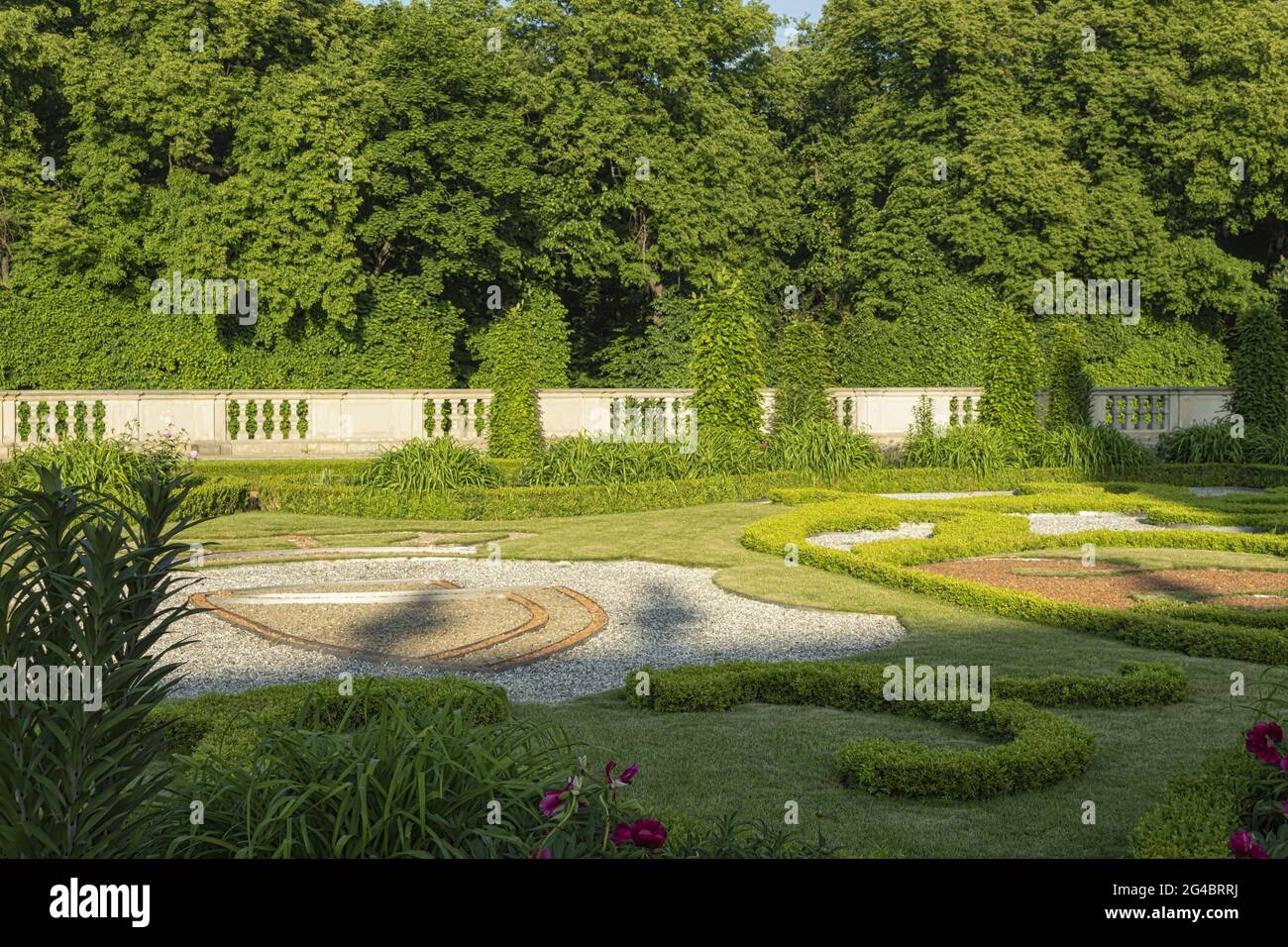 Beautiful and well-kept gardens at the royal castle. Ancient castle and royal park near the castle Stock Photo