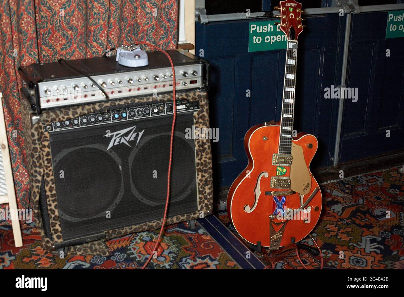 GREAT BRITAIN / England /Electric guitar and amplifier set up indoor for nighttime performance Stock Photo