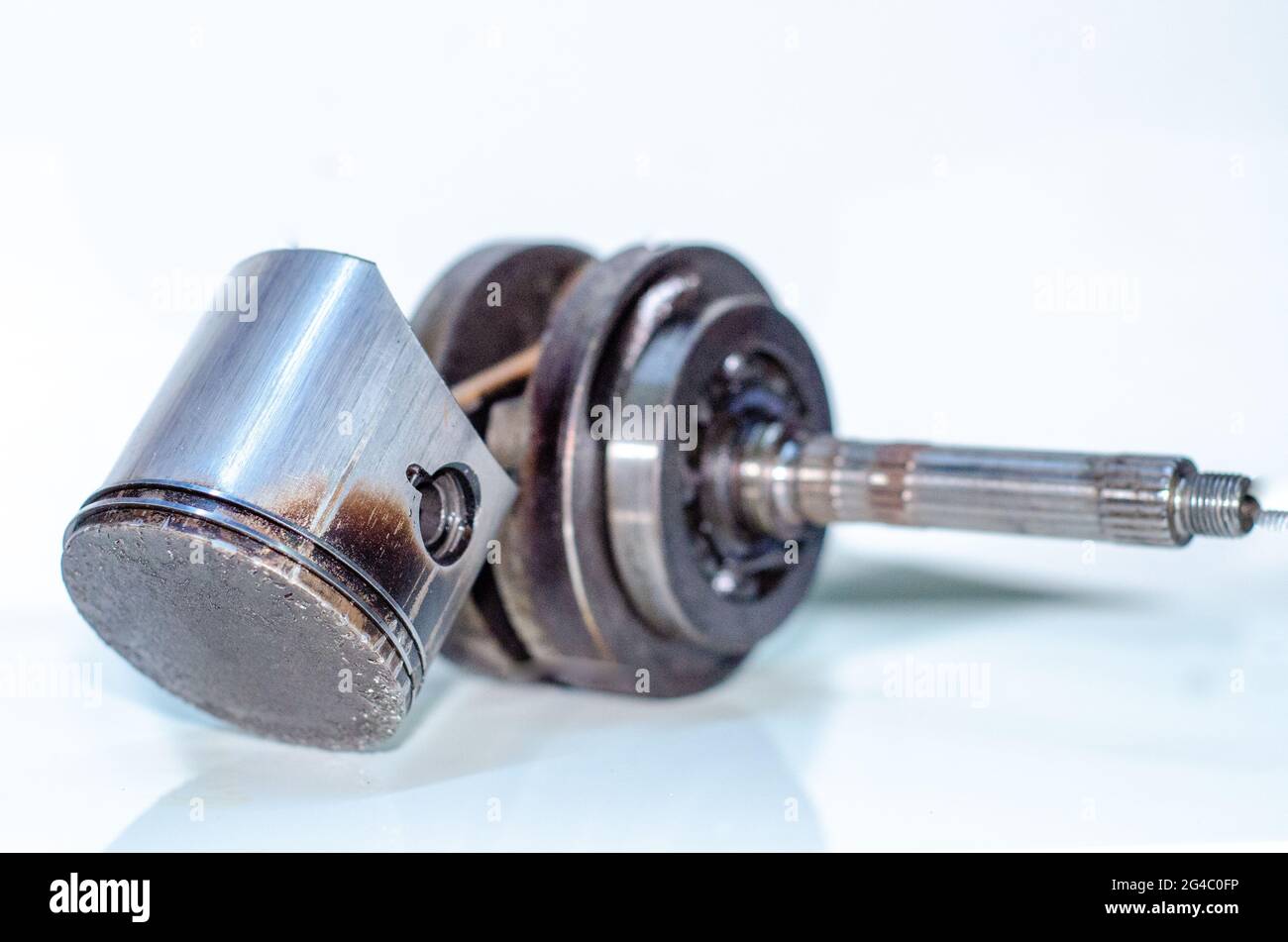 A closeup shot of crankshaft bearing overheating and piston isolated on