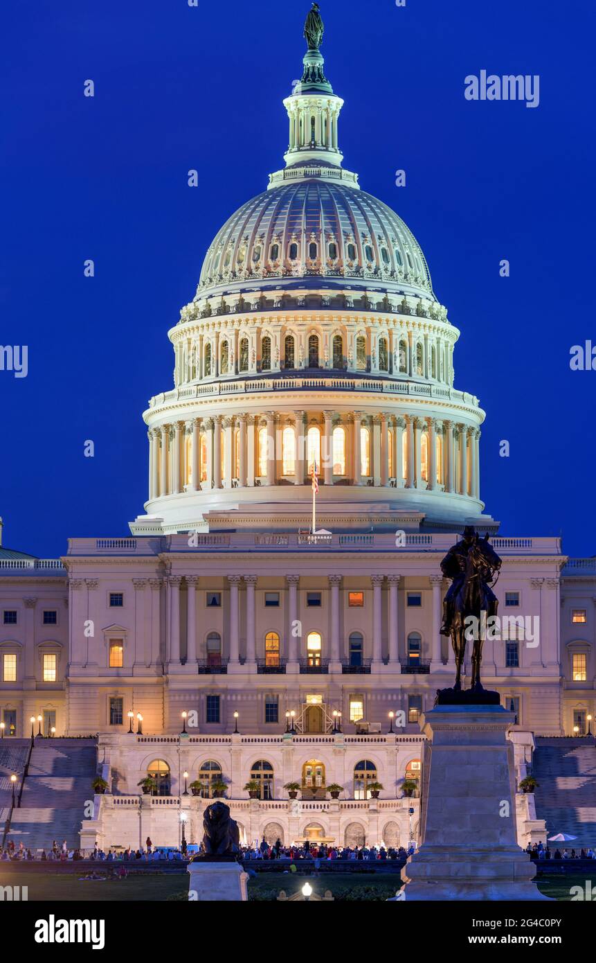 The Capitol at Night - A close-up view of west front of the U.S. Capitol Building, against a clear blue Summer night sky, Washington, D.C., USA. Stock Photo