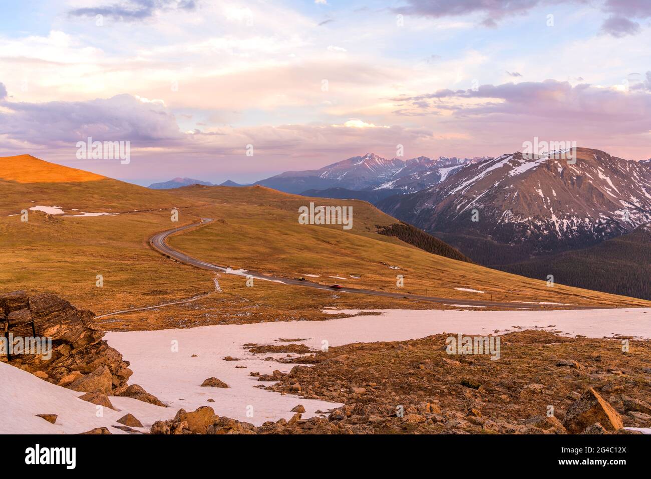 Sunset Trail Ridge Road - A Spring sunset at Trail Ridge Road, with Longs Peak (14,255 feet) rising high in the background, RMNP, Colorado, USA. Stock Photo