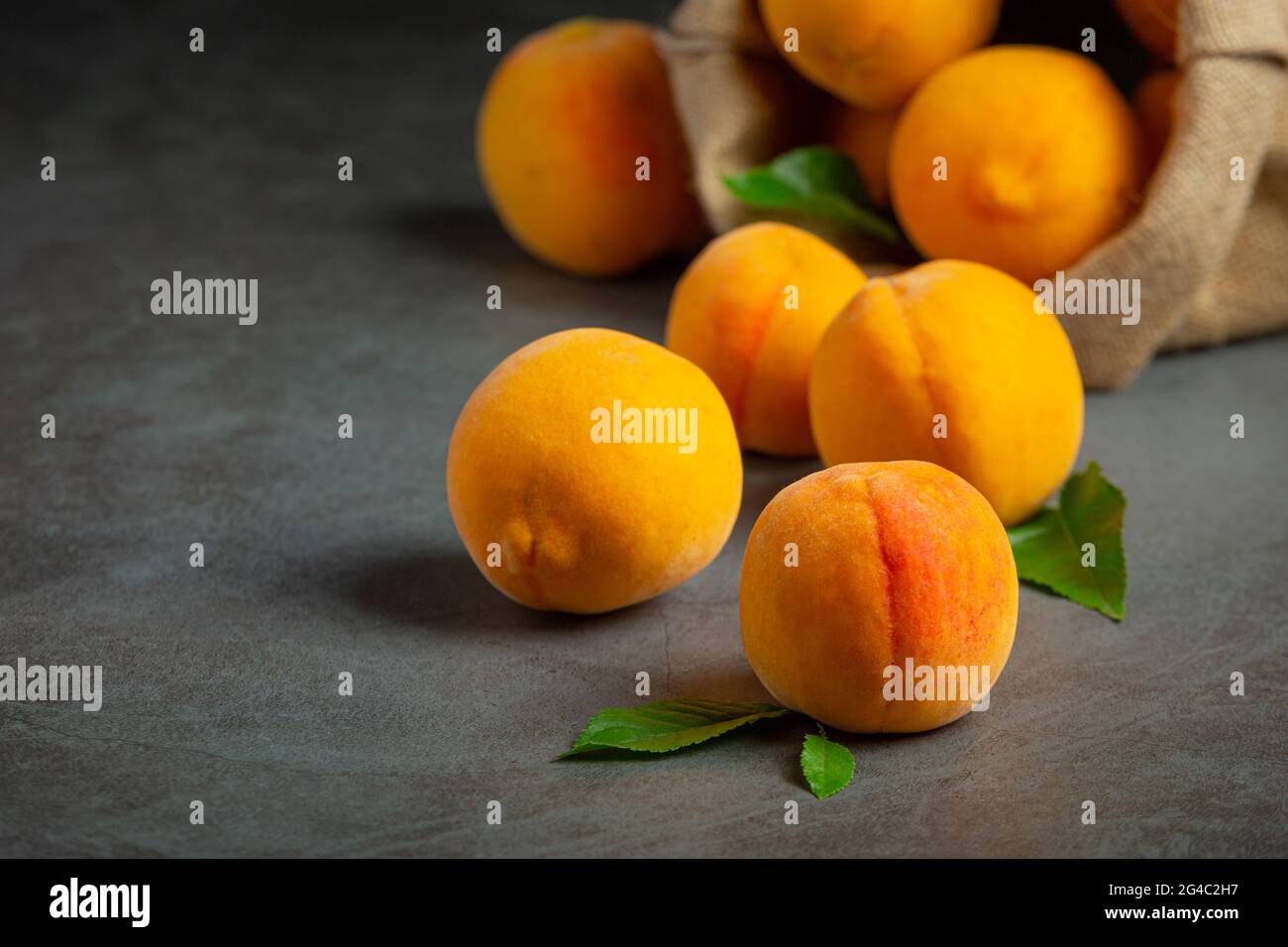 peaches on a black background Stock Photo