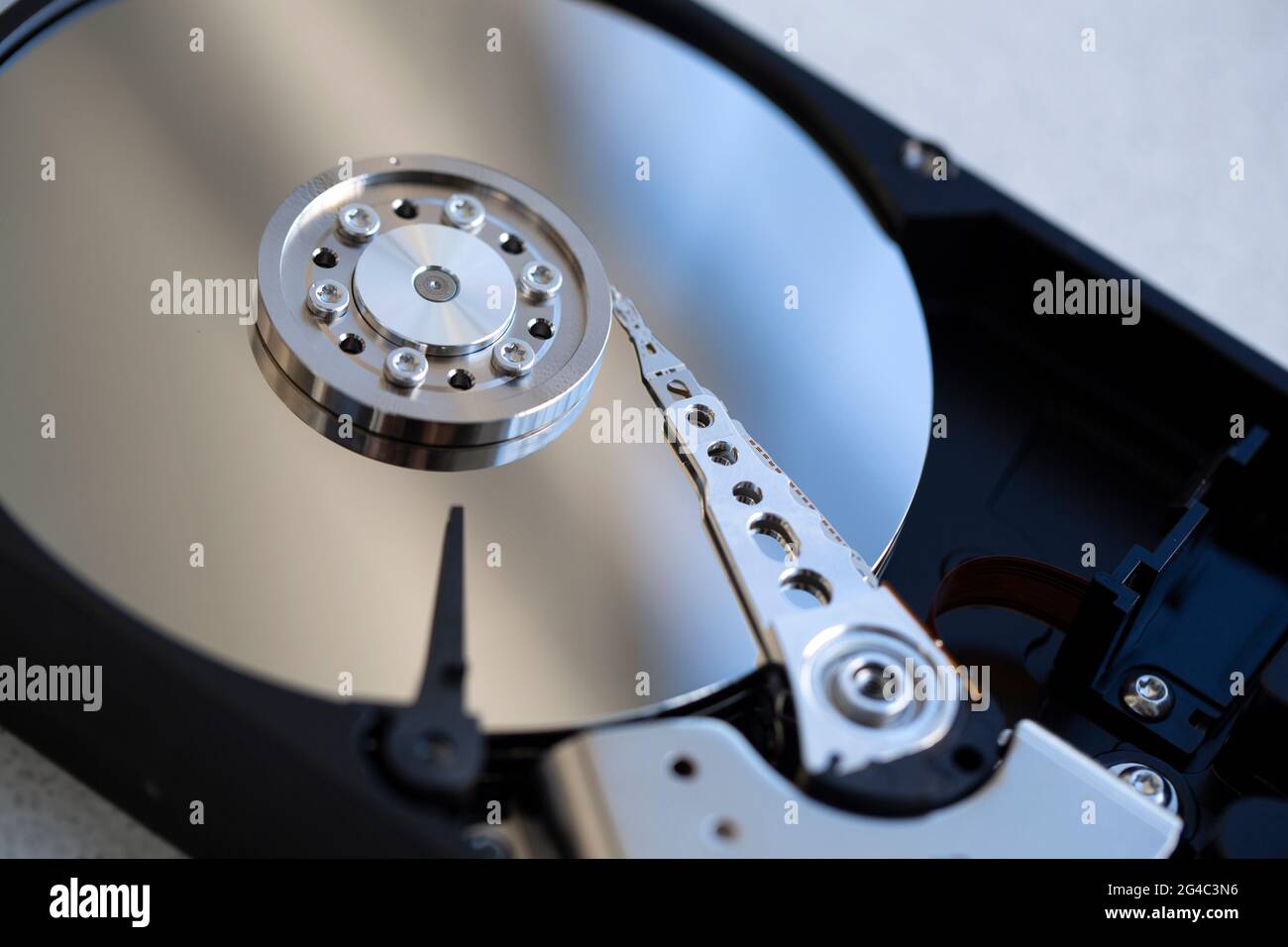 Hard disk of a computer opened for repair Stock Photo