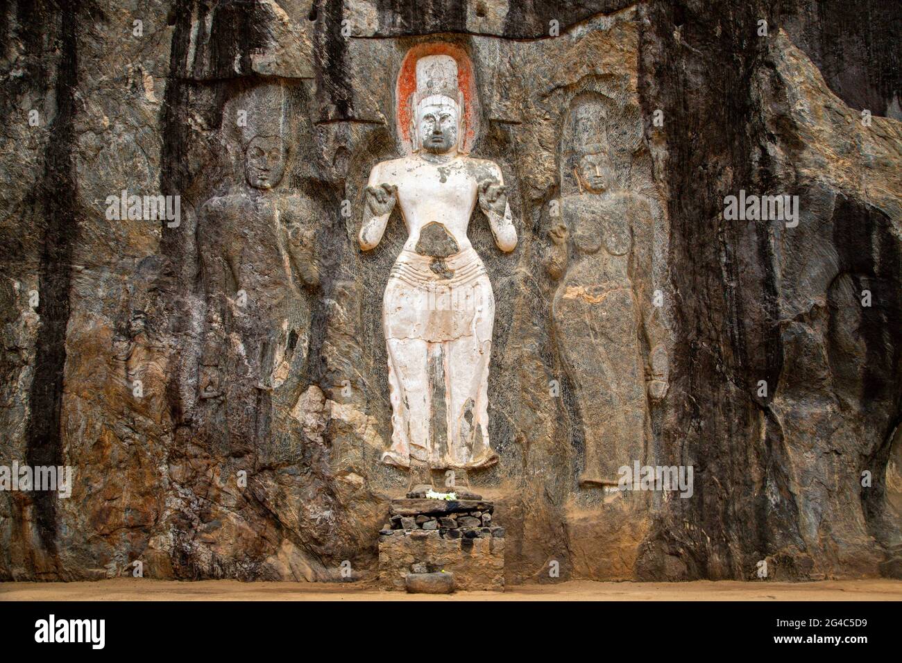 Antique Buddha reliefs carved out on the rock in Buduruwagala, Sri Lanka Stock Photo