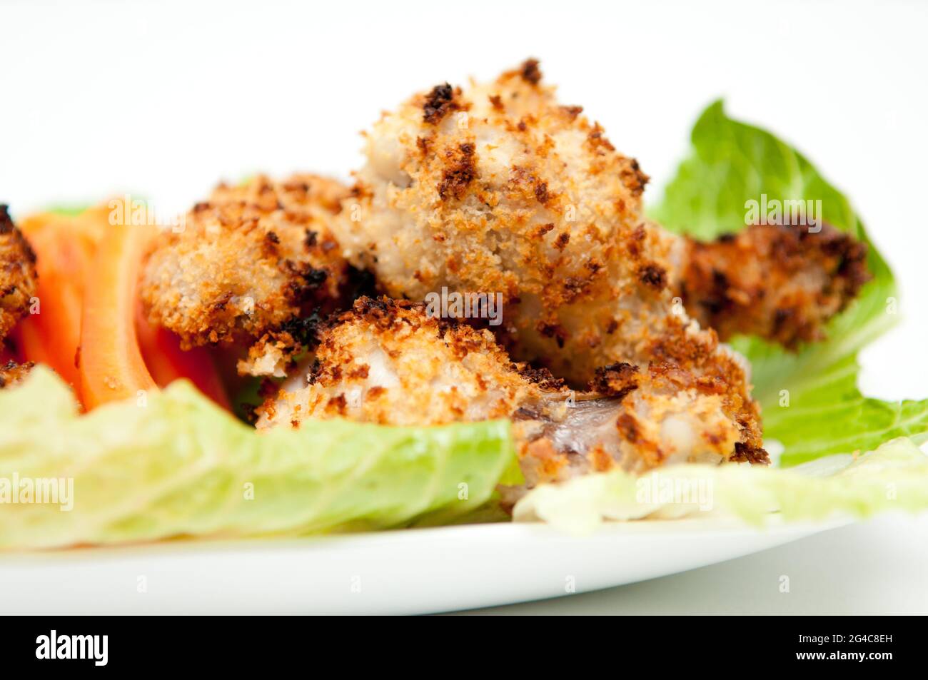 An ovenroasted BBQ chicken wings healthy baked instead of fried Stock