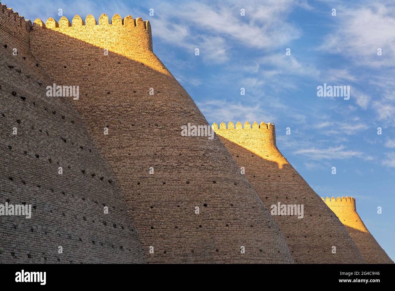 Ancient city walls of Bukhara, at the sunset, Uzbekistan. Stock Photo