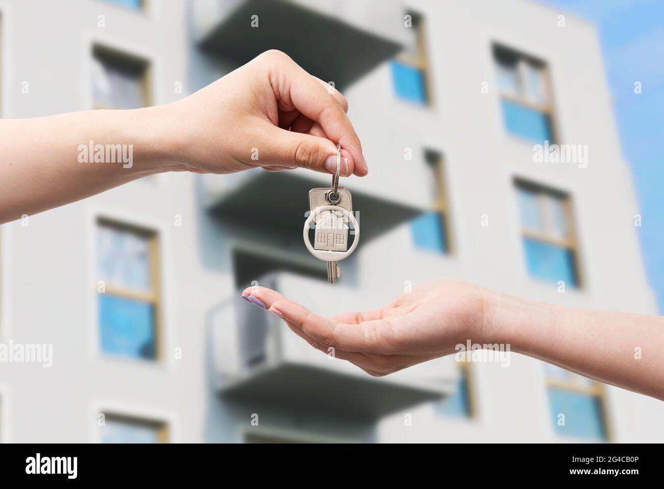 Hand holds the keys to the house, purchase of your own apartment concept Stock Photo