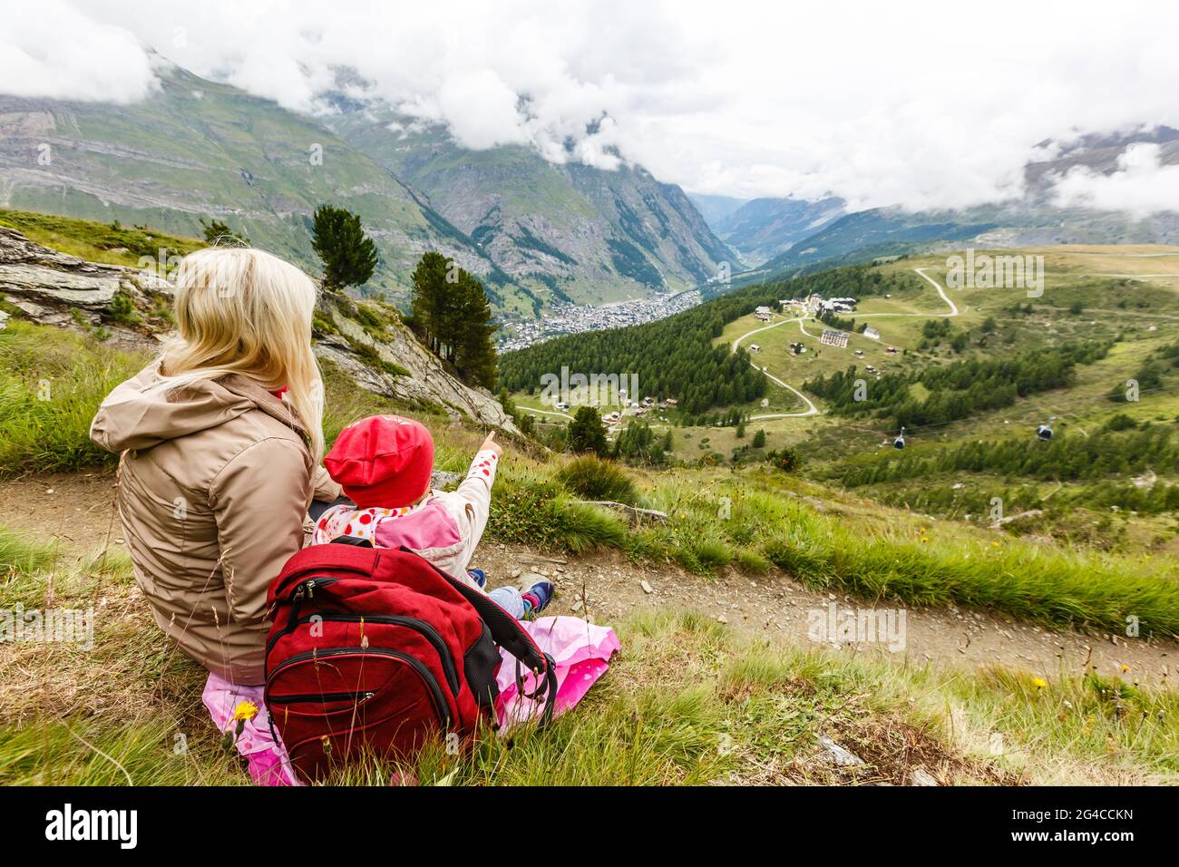 happy family hiking in scenic mountains Stock Photo - Alamy
