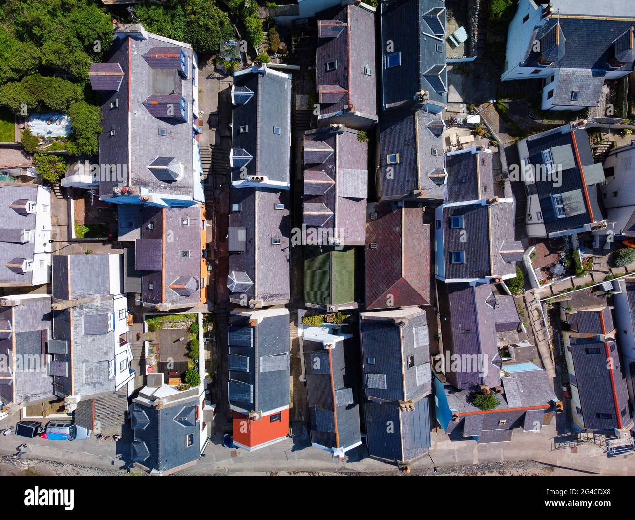 Aerial view from drone of tightly packed cottages in Seatown at historic village of Gardenstown on Moray firth Coast in Aberdeenshire, Scotland, Uk Stock Photo