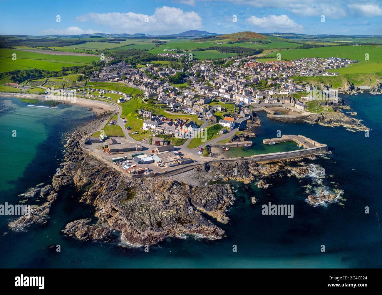 Aerial of historic harbours and village at Portsoy in Aberdeenshire on the Moray Firth, Scotland, UK Stock Photo