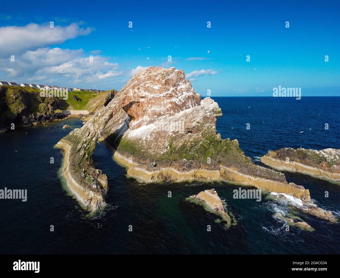 Aerial view from drone of Bow Fiddle Rock at Portknockie on Moray Firth in Moray, Scotland, UK Stock Photo