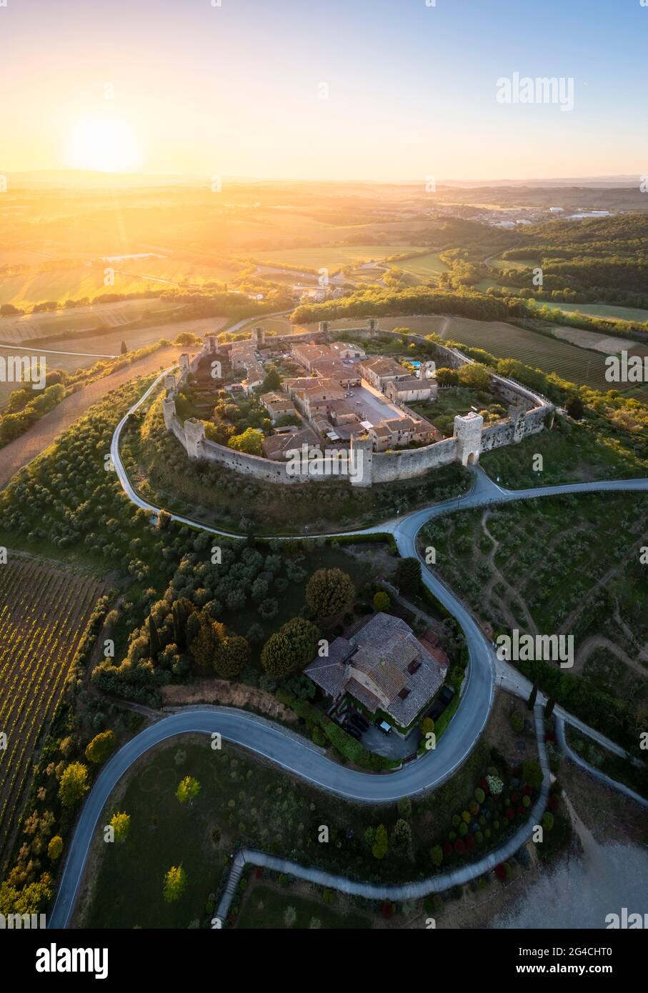 Aerial view of the medieval town of Monteriggioni at sunset. Monteriggioni, Siena district, Tuscany, Italy. Stock Photo