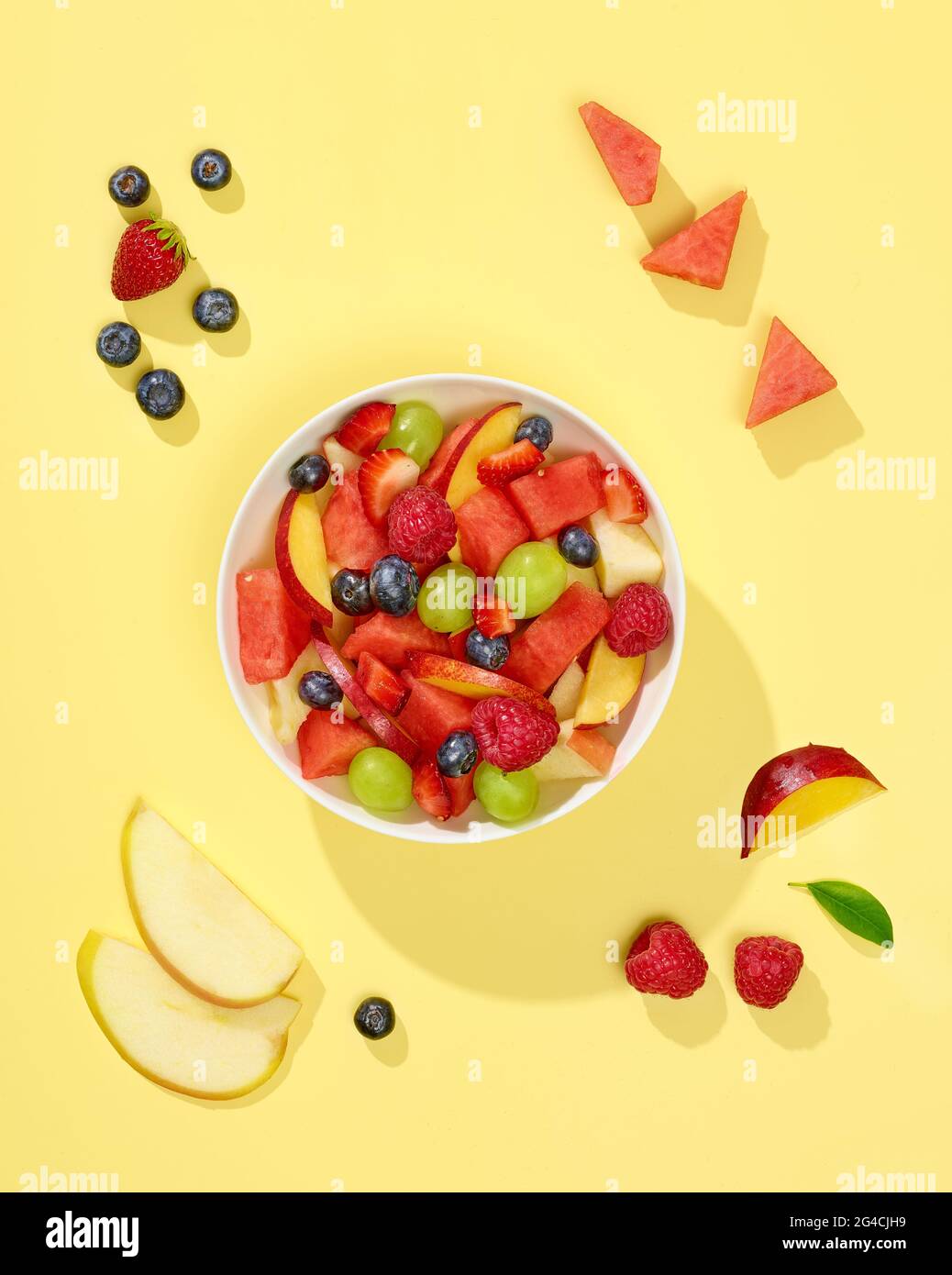Fruit salad bowl banana raspberry hi-res stock photography and images ...