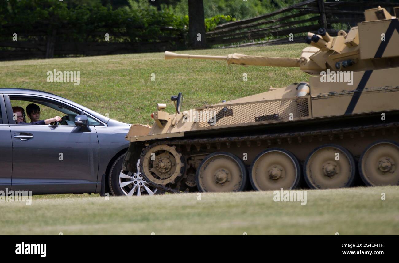 Milton Canada 20th June 2021 People Look At A Military Vehicle From Their Car At The 2021 Mega Wheels Drive Thru Event In Milton Ontario Canada On June 20 2021 The Drive Thru Event