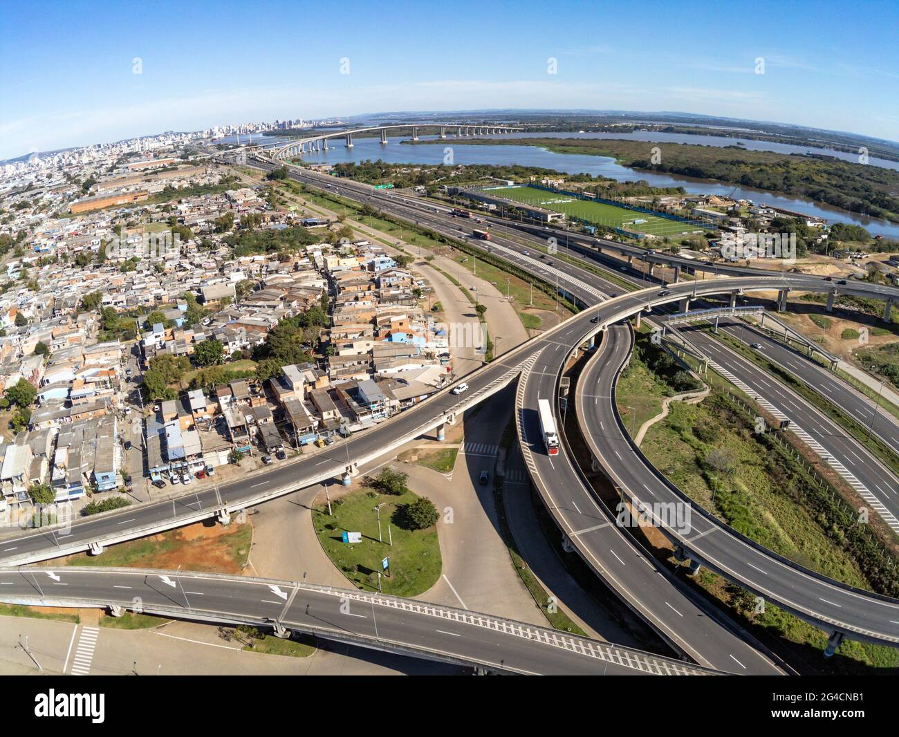 Aerial view of Humaita area with houses, Jacui river, highways and bridges, Porto Alegre, Rio Grande do Sul, Brazil Stock Photo