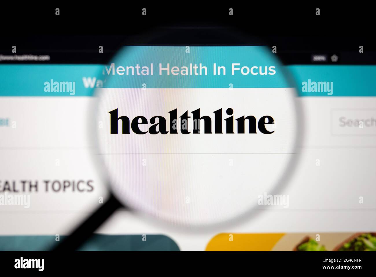Healthline company logo on a website, seen on a computer screen through