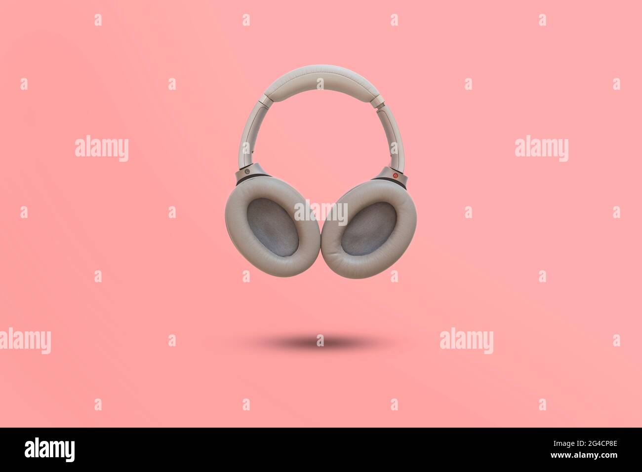 simple wireless headphones isolated floating in the air against the