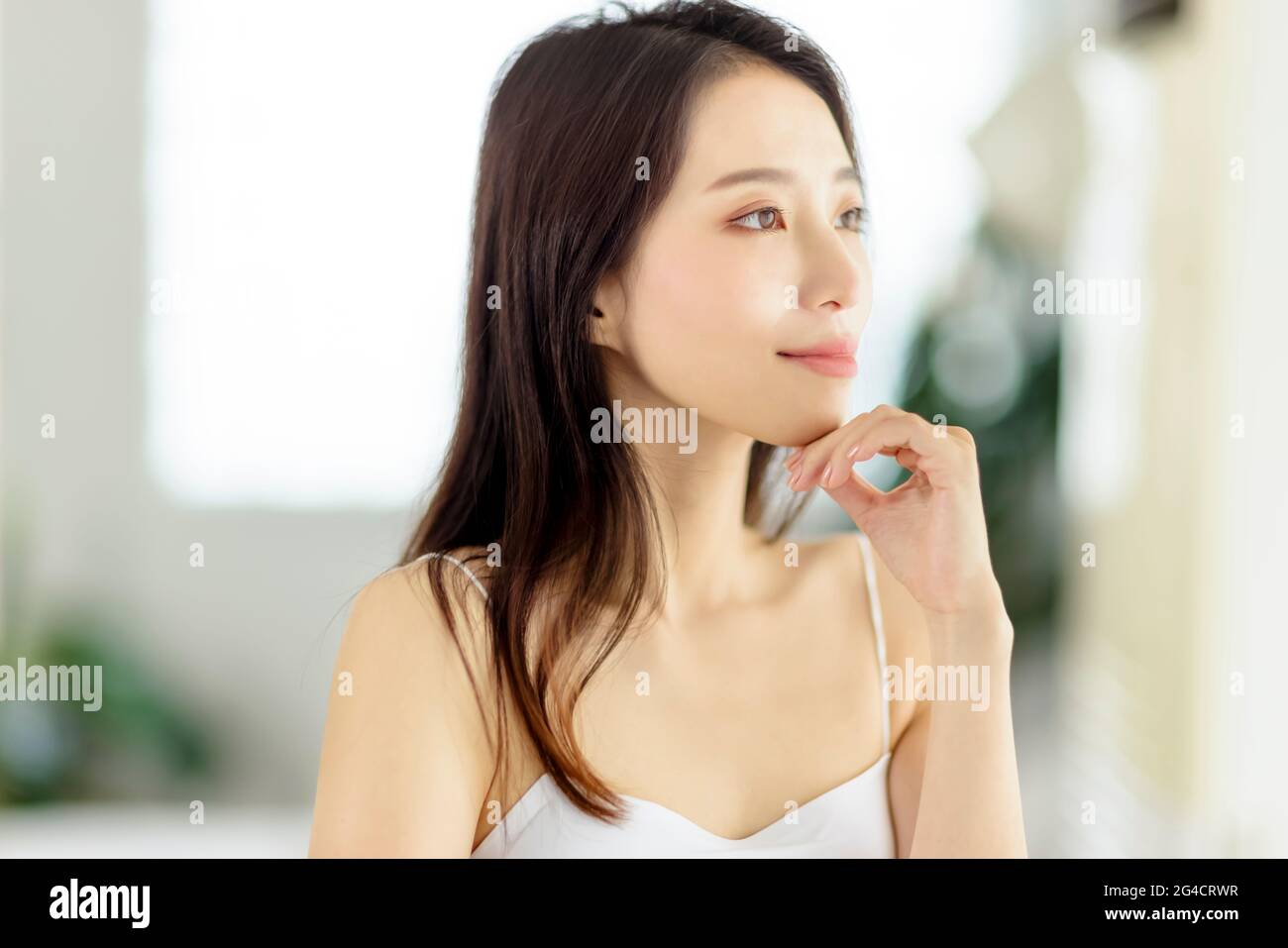 Young asian woman with clean  healthy skin Stock Photo