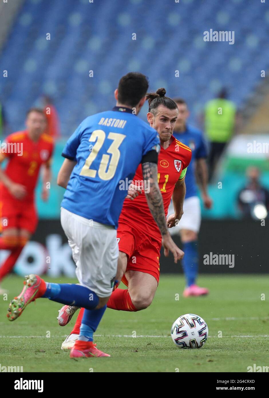 Rome. 20th June, 2021. Wales' Gareth Bale (R) breaks through during the  UEFA EURO 2020 Group A football match between Italy and Wales at the  Olympic Stadium in Rome on June 20,