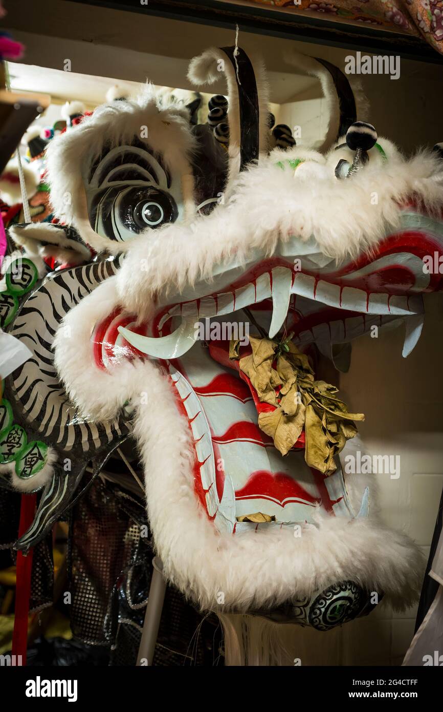 The hand-made head of a dragon used for a Chinese Dragon Dance performed at festivals such as Chinese New Year, Sai Kung, New Territories, Hong Kong Stock Photo