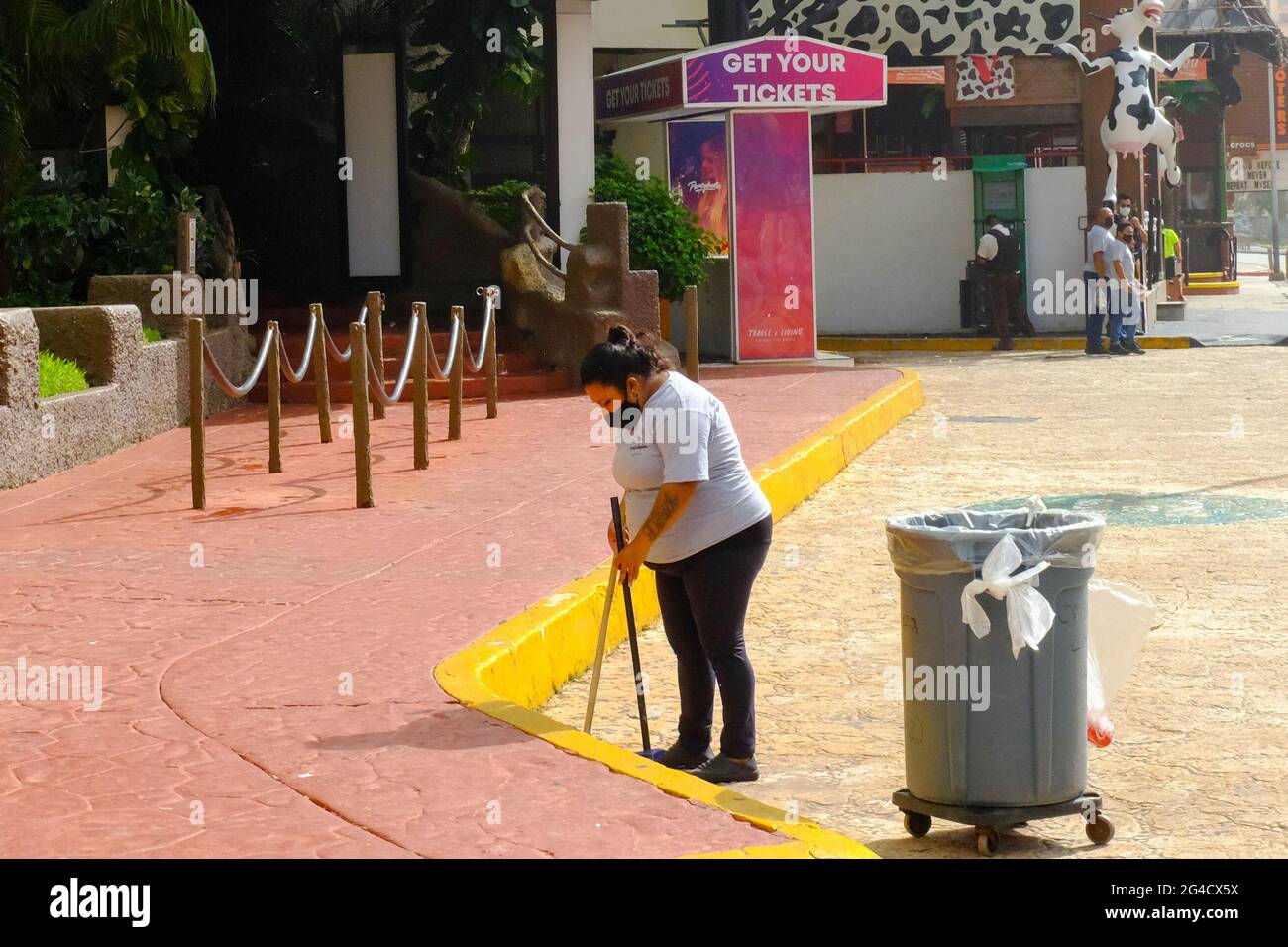 Female worker cleaning the street, Cancun Mexico Stock Photo Alamy