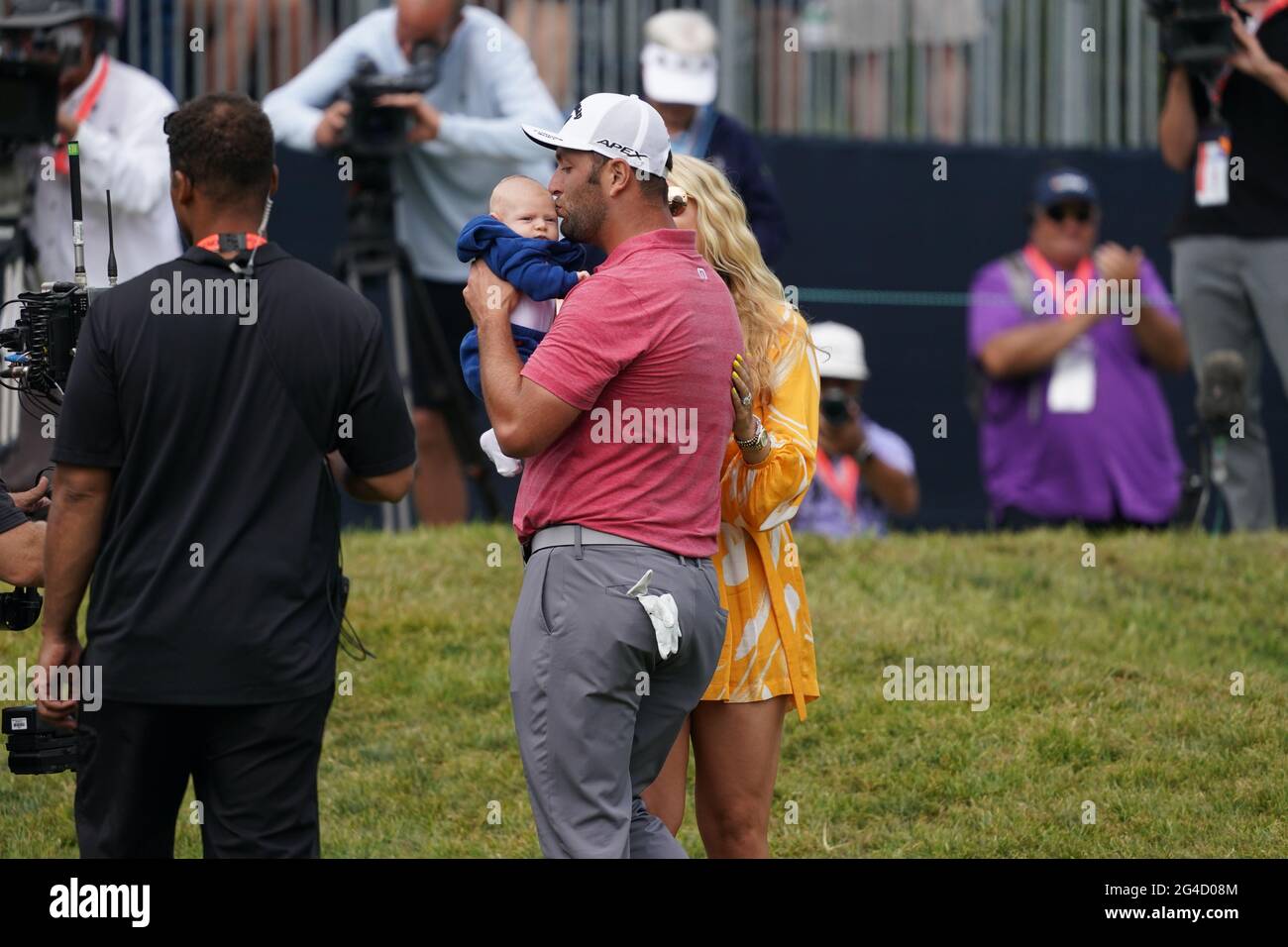 Jon Rahm is met by his wife Kelley Cahill and son Kepa on the 18th hole during the fourth round of the 2021 U.S. Open Championship in golf at Torrey Pines Golf Course in San Diego, California, USA on June 20, 2021. Credit: J.D. Cuban/AFLO/Alamy Live News Stock Photo