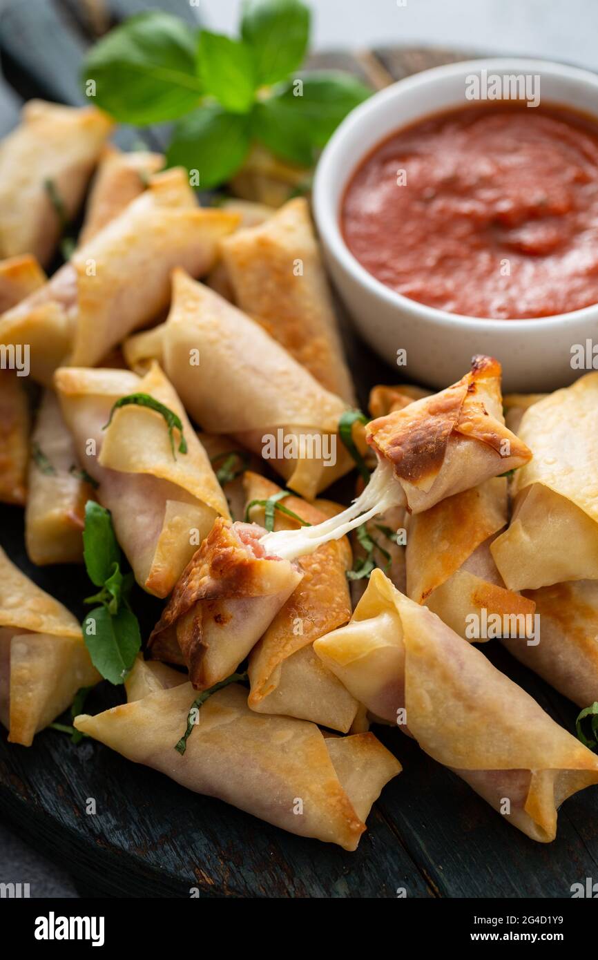 Homemade mozzarella and salami sticks with marinara Stock Photo Alamy