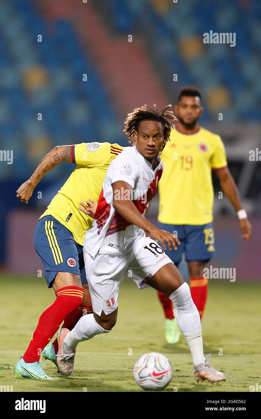 Goiania. 20th June, 2021. Andre Carrillo (front) of Peru controls the ball during a Group B match between Colombia and Peru at the American Cup 2021 in Goiania, Brazil on June 20, 2021. Credit: Lucio Tavora/Xinhua/Alamy Live News Stock Photo