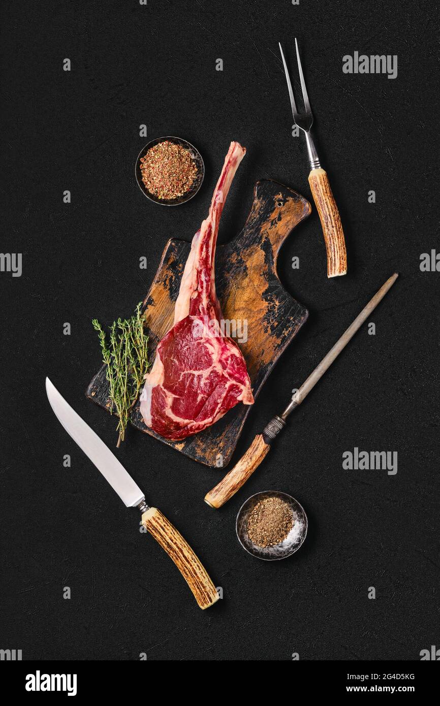 Preparation of tomahawk steak (view from above) Stock Photo