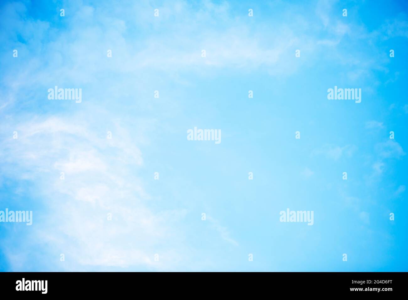 Blue sky background and white clouds soft focus, and copy space horizontal shape Stock Photo