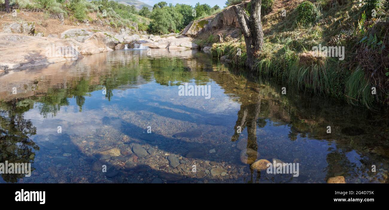 Acebo natural swimming pool. Crystal-clear waters spot in the heart of Sierra de Gata hills. Caceres, Extremadura, Spain Stock Photo