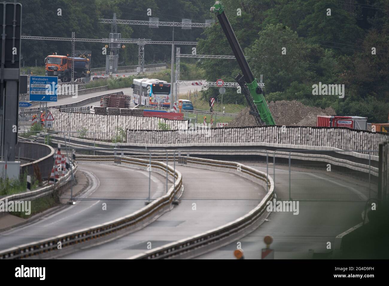 wiesbaden germany 21st june 2021 a bus rejoins the a66 behind the bridge during rush hour traffic after the salzbachtal bridge was closed the motorway bridge was fully closed on friday evening