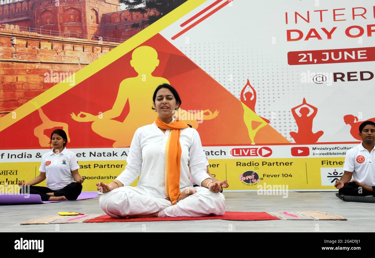 New Delhi. 21st June, 2021. People perform yoga at Red Fort in Delhi, India, on June 21, 2021, the International Yoga Day. Credit: Partha Sarkar/Xinhua/Alamy Live News Stock Photo