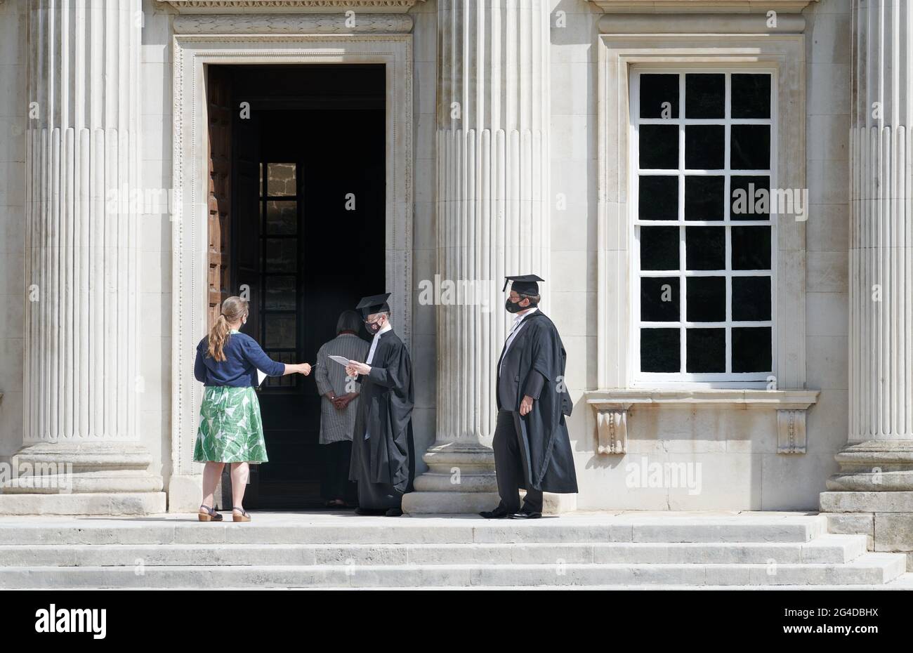 University staff practise the procedure for awarding degrees to students in June 2021 at Senate House, university of Cambridge, England. Stock Photo