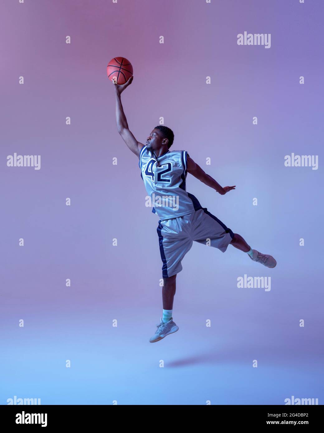 Basketball player with ball, jump in action Stock Photo Alamy
