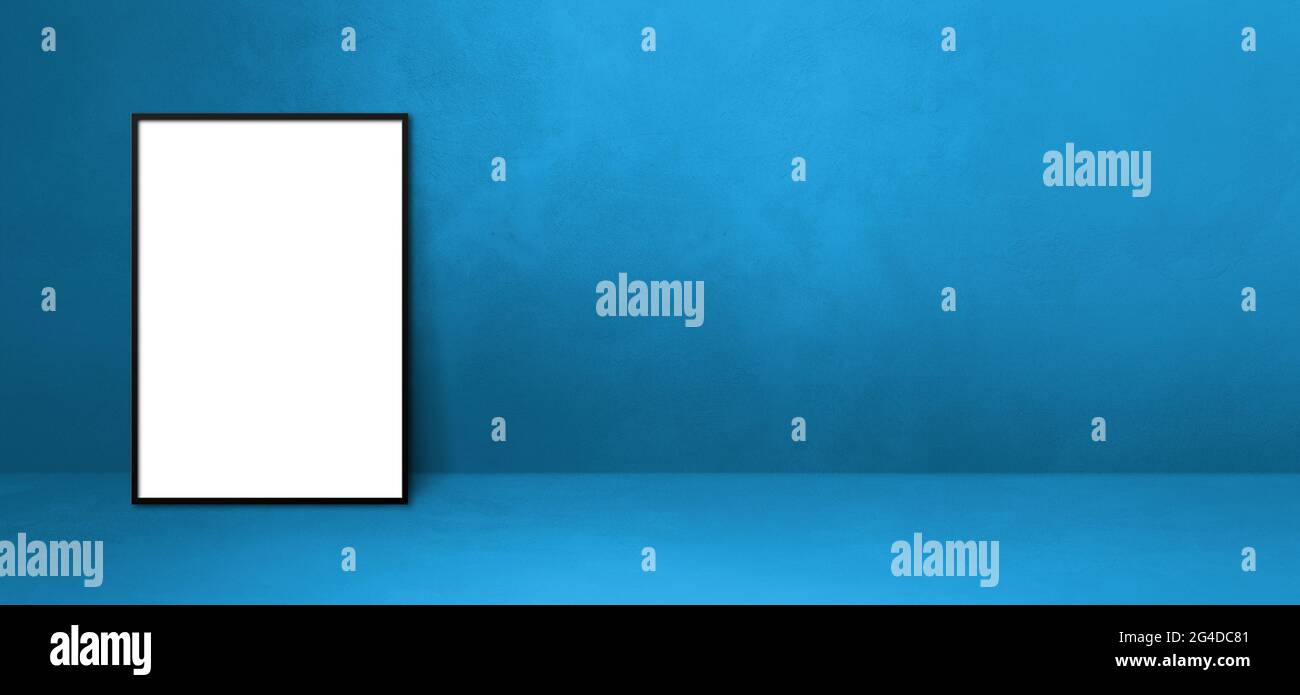 Black picture frame leaning on a blue wall. Blank mockup template ...