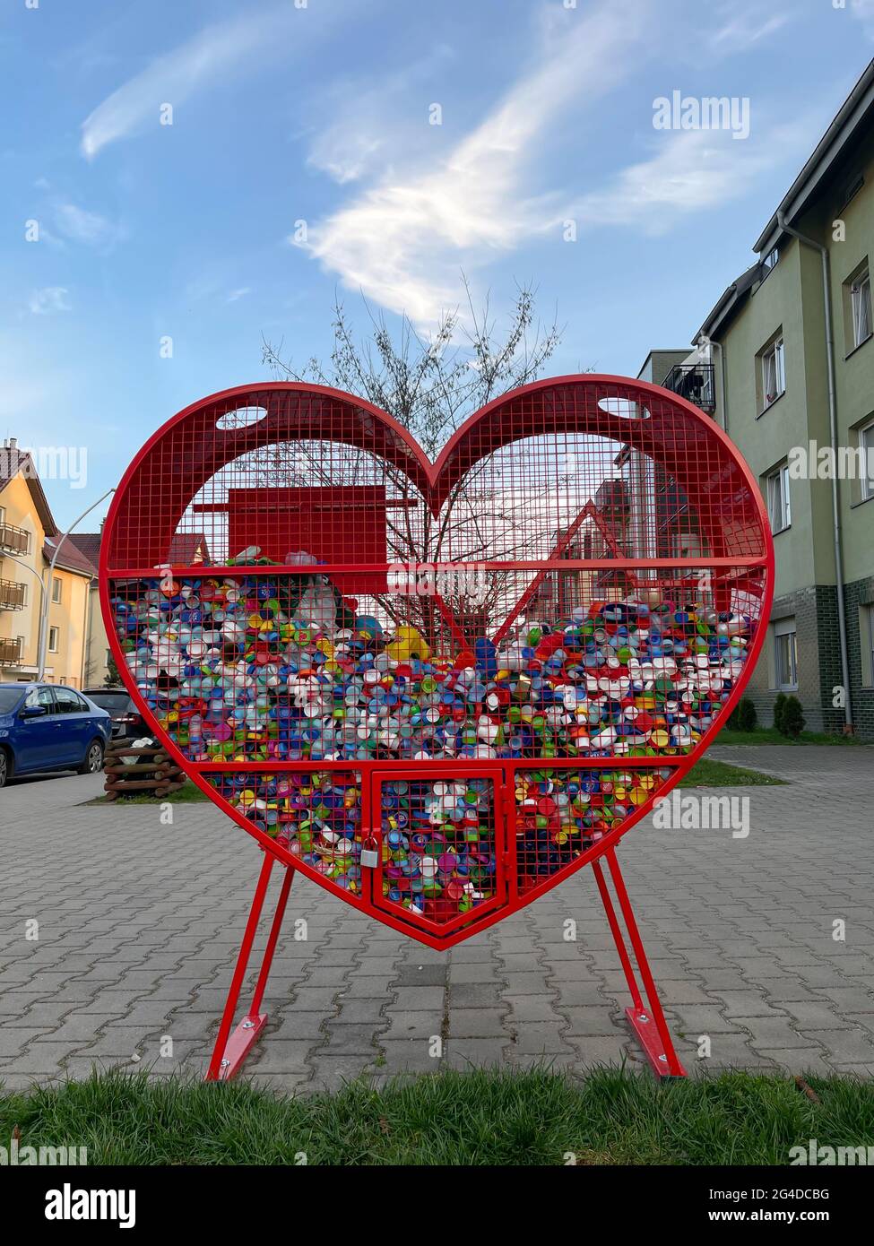 Wroclaw, Poland March 31, 2021: Place for collecting colorful plastic bottle  caps for recycling and charity. Heart shaped metal container Stock Photo -  Alamy