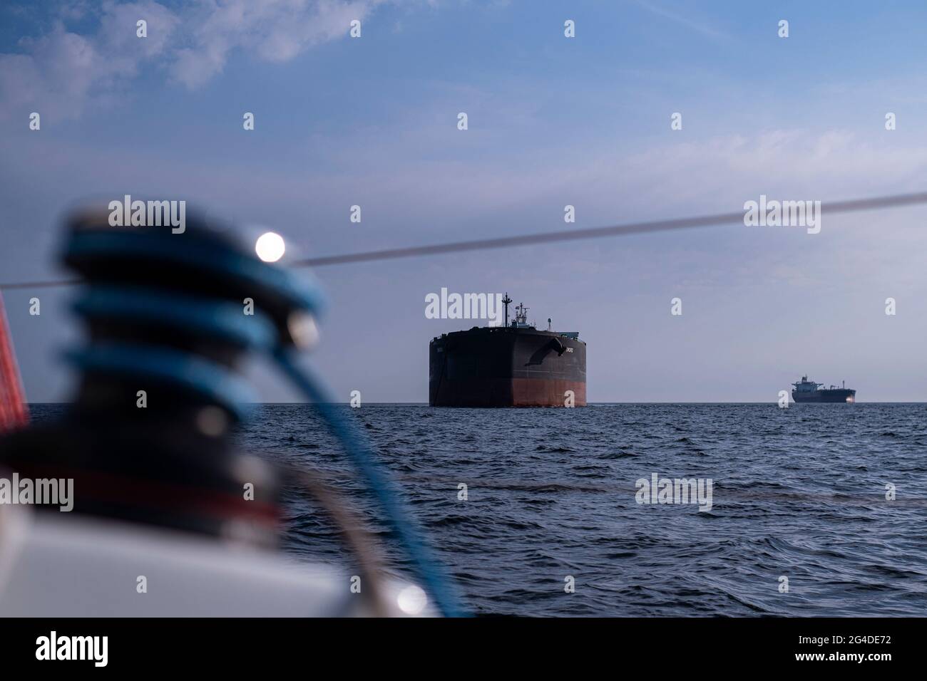 Cargo ship anchoring in the roads Stock Photo