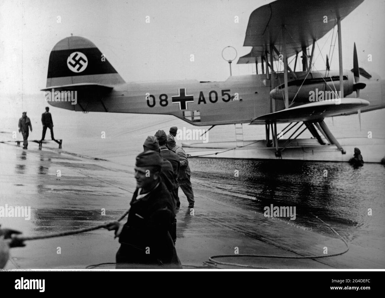 transport / transportation, aviation, seaplane, Heinkel He 59 of the Luftwaffe (German Air Force), at a beach, circa 1940, EDITORIAL-USE-ONLY Stock Photo