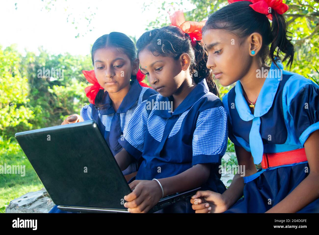 indian village government school girls operating laptop computer system