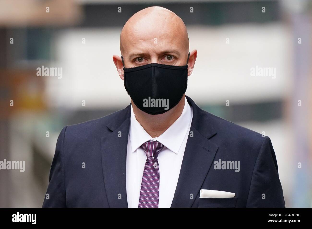 West Mercia Police constable Benjamin Monk arrives at Birmingham Crown Court where he is accused of the murder and an alternative charge of manslaughter, of former footballer Dalian Atkinson. His colleague Mary Ellen Bettley-Smith is charged with assaulting Mr Atkinson. Picture date: Monday June 21, 2021. Stock Photo