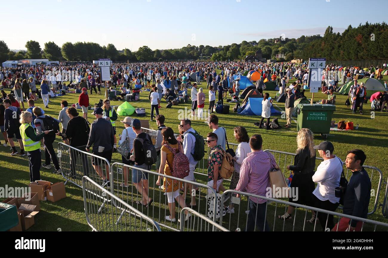 File photo dated 01-07-2019 of People arrive to join ticket queues in Wimbledon Park on day one of the Wimbledon Championships at the All England Lawn Tennis and Croquet Club, Wimbledon. Issue date: Monday June 21, 2021. Stock Photo
