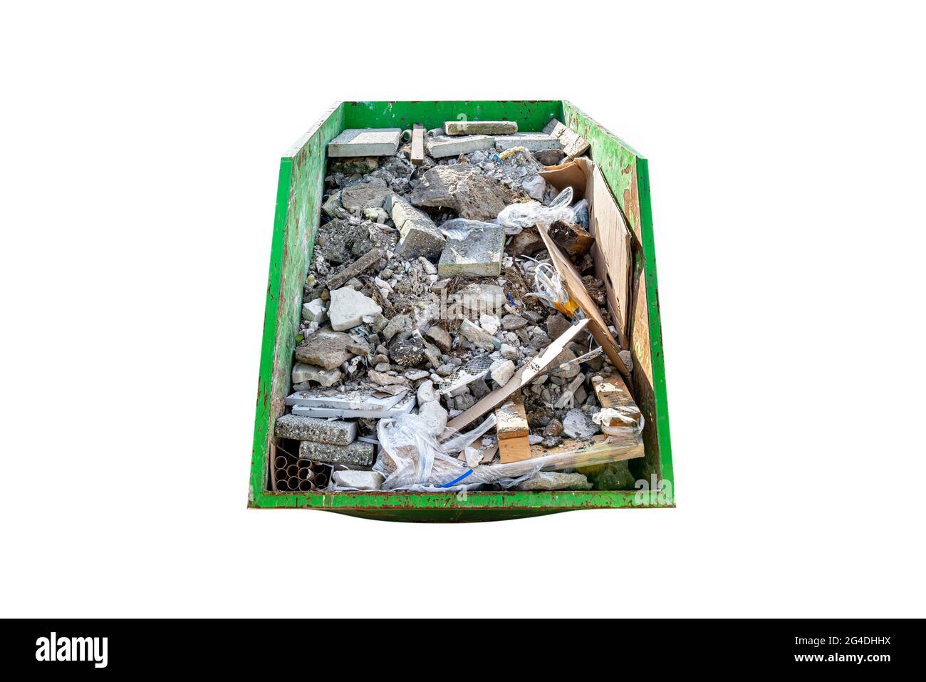 Large metal green container filled with rubble and construction waste, isolated on white background with a clipping path. Stock Photo