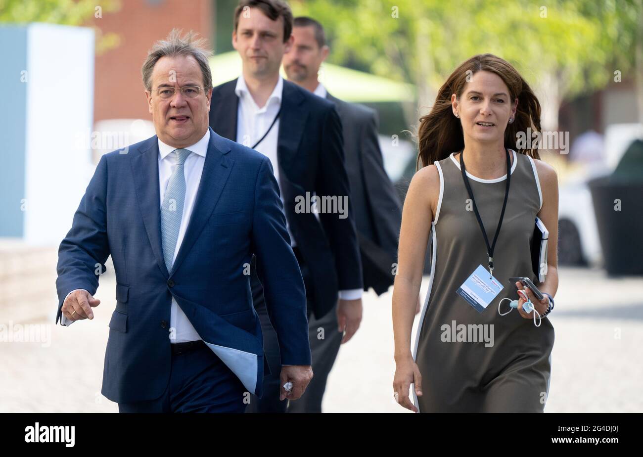 Berlin, Germany. 21st June, 2021. Armin Laschet, CDU candidate for  Chancellor, CDU Federal Chairman and Minister President of North  Rhine-Westphalia, and Tanit Koch, communications advisor to the candidate  for Chancellor, arrive for