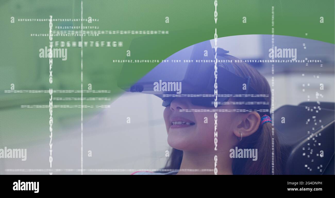 Data processing against girl wearing vr headset against green technology concept Stock Photo
