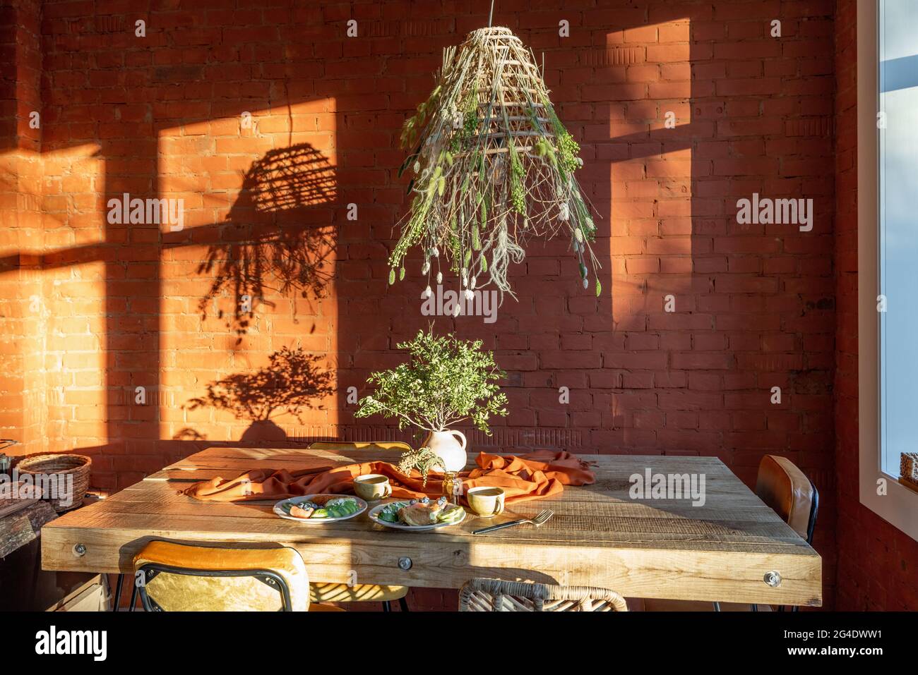 Dining place with a wooden table Stock Photo