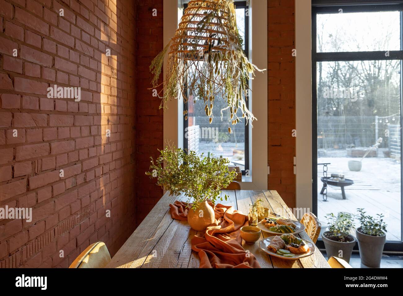 Dining place with a wooden table Stock Photo