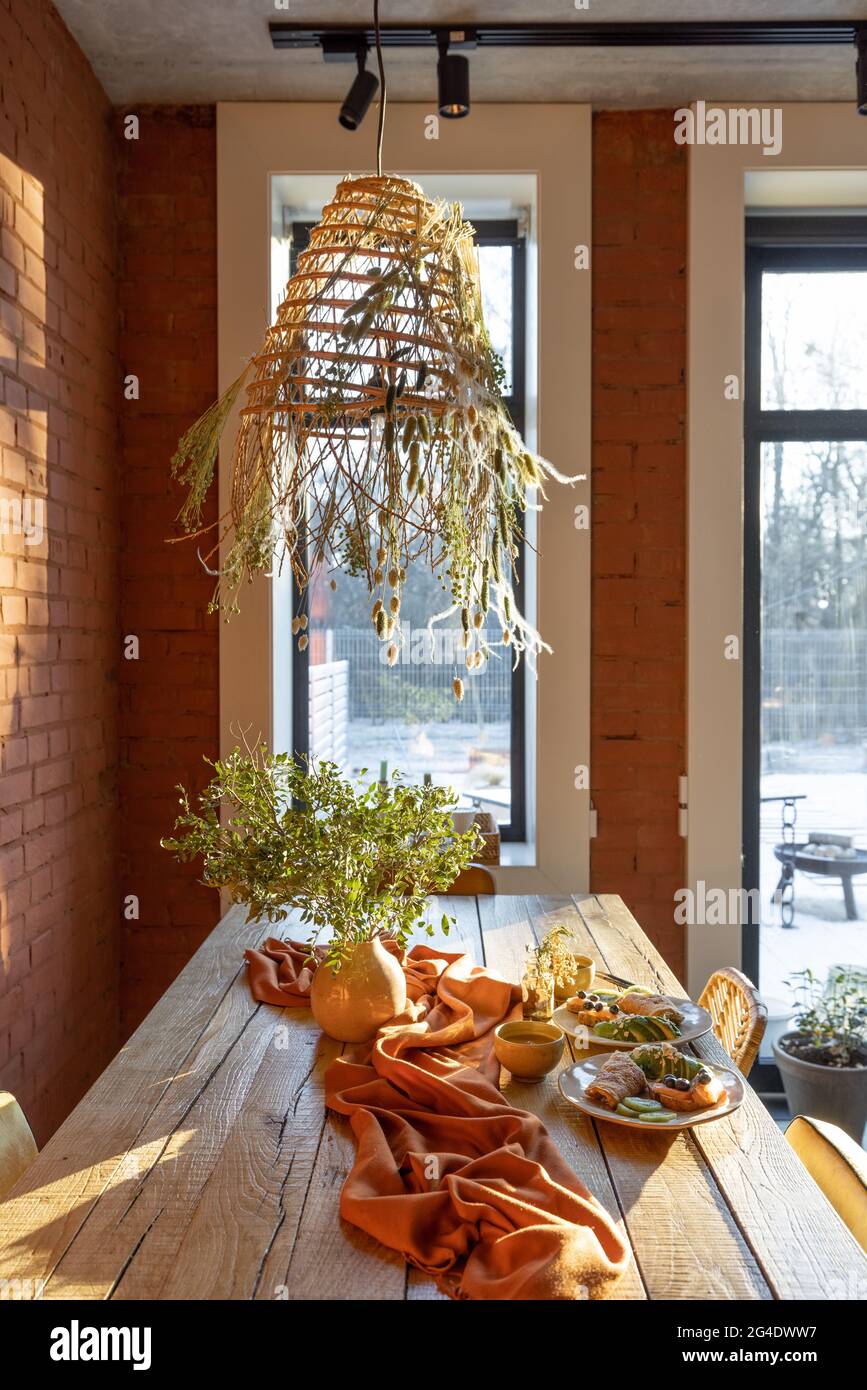 Dining place with a wooden table Stock Photo